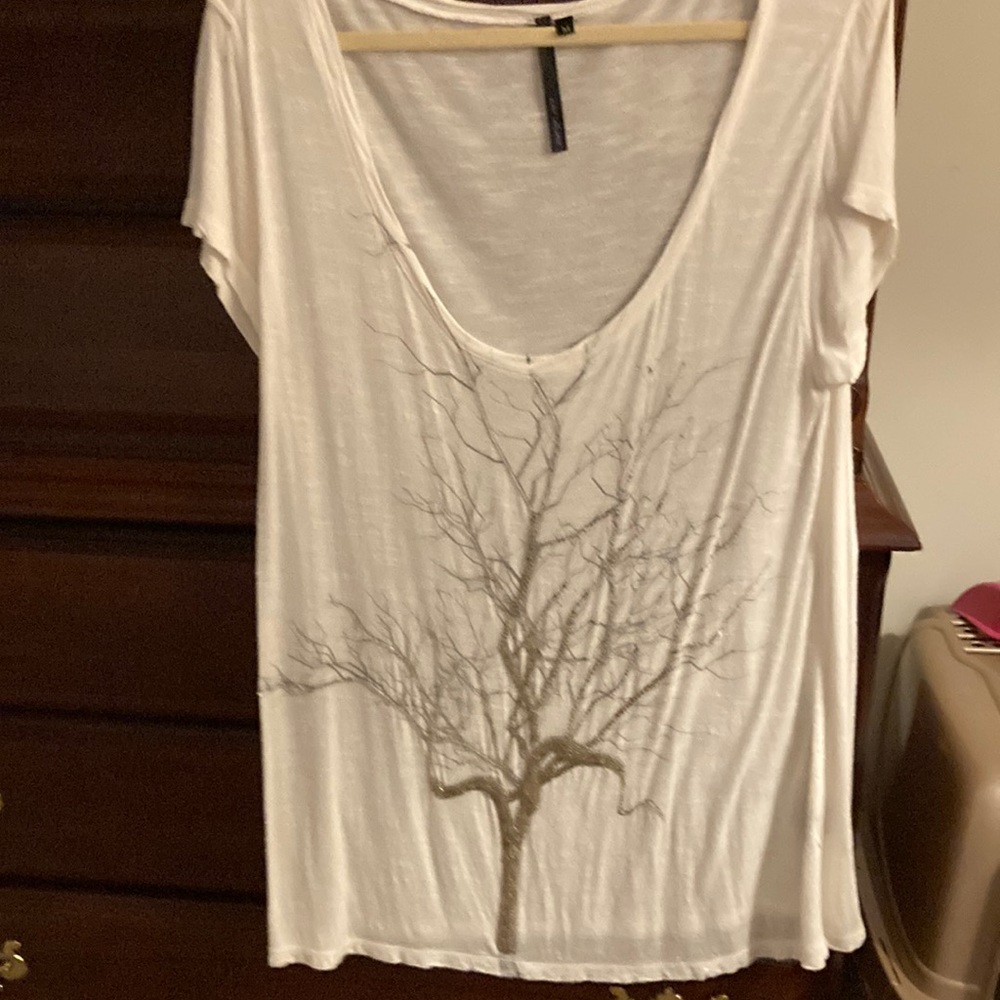 Anthropologie Kay Celine Short sleeved cream tunic with sequent beaded front.